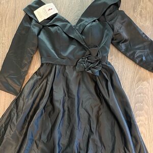 Elegant Black Dress with Floral Detail